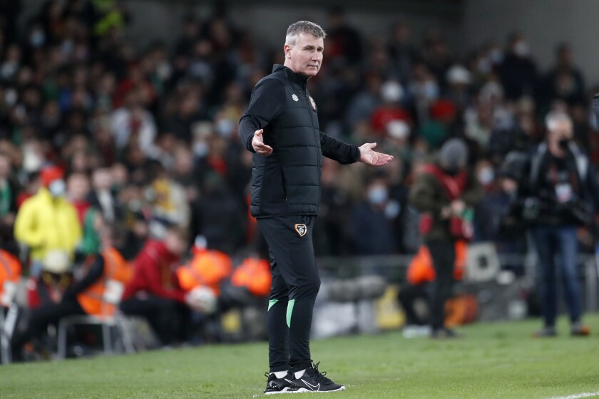 FILE - Ireland coach Stephen Kenny gestures during the World Cup 2022 group A qualifying soccer match between the Republic of Ireland and Portugal at the Aviva stadium in Dublin, Thursday, Nov. 11, 2021. Ireland coach Stephen Kenny's “big dream” is to qualify for the 2024 European Championship now that he's signed a contract extension. Kenny discussed his goals for Ireland at a press conference on Thursday, March 10, 2022, a day after he was given an extension through the Euro 2024 being held in Germany. (AP Photo/Peter Morrison, File)