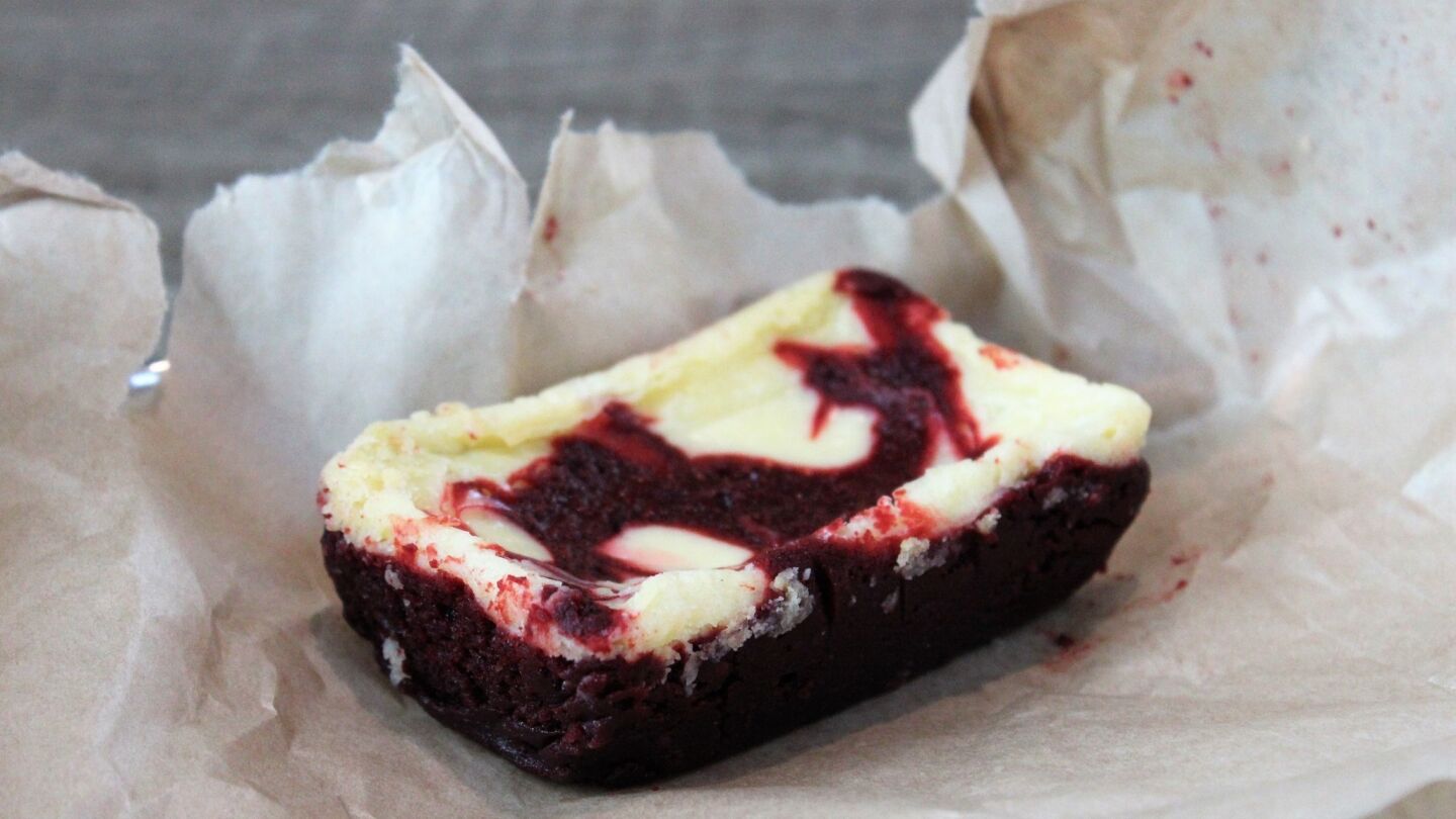 If the red velvet cheesecake brownie at 'Laine's Bake Shop looks familiar, it’s not just because it takes all your favorite baked goods and rolls them up into one. You might have seen it at a dozen or so Starbucks around Chicago. Baker Rachel Bernier-Green also makes cookies found at dozens of Whole Foods across the Midwest. But there’s only one place you can sit down and treat yourself to the full menu by Bernier-Green including those brownies, cookies, warm bread pudding with caramel sauce and more. She, with husband Jaryd, founded the family artisan baking company with a social mission in 2013, but just opened at the One Eleven Food Hall in the Pullman neighborhood on the South Side this spring. Grab coffee or breakfast sandwiches too, but remember the red velvet cheesecake brownie, heavy for its handy size, fruity notes swirling with tart cream and soft cocoa crumb. $3.50. 756 E. 111th St. at One Eleven Food Hall, 773-432-4308, lainesbakeshop.com — Louisa Chu For a dining guide to One Eleven Food Hall, go here.