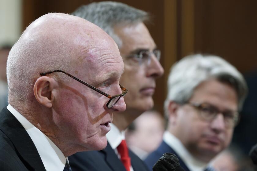 Arizona House Speaker Rusty Bowers, left, testifies as the House select committee investigating the Jan. 6 attack on the U.S. Capitol continues to reveal its findings of a year-long investigation, at the Capitol in Washington, Tuesday, June 21, 2022, as Georgia Secretary of State Brad Raffensperger and Georgia Deputy Secretary of State Gabriel Sterling, look on. (AP Photo/J. Scott Applewhite)