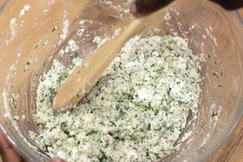 Stir together ricotta, Parmigiano-Reggiano, parsley, salt and egg until well-combined.