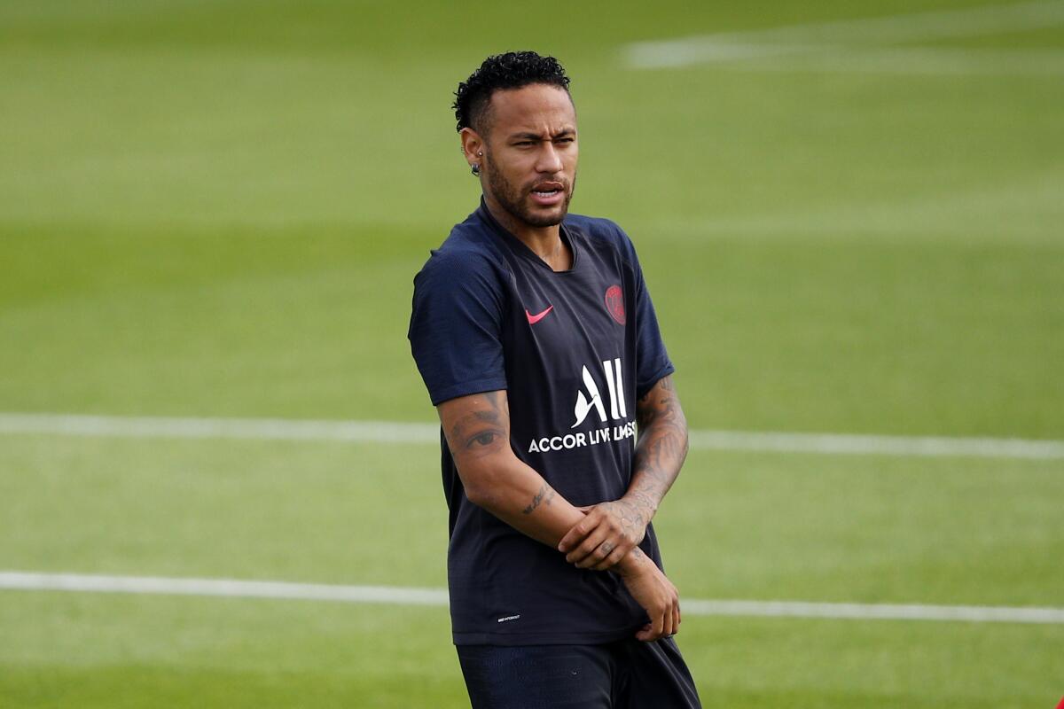 PSG's Neymar attends a training session at Camp des Loges in Saint Germain en Laye, outside Paris, France, Saturday, Aug. 10, 2019. (AP Photo/Francois Mori)