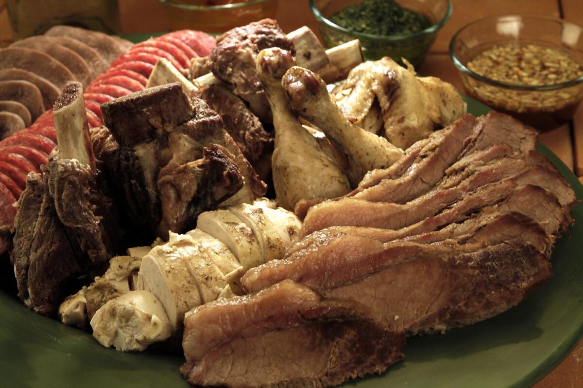 Bollito misto, which can include different cuts of meat depending on the chef, with sauces, from a Los Angeles Times recipe.