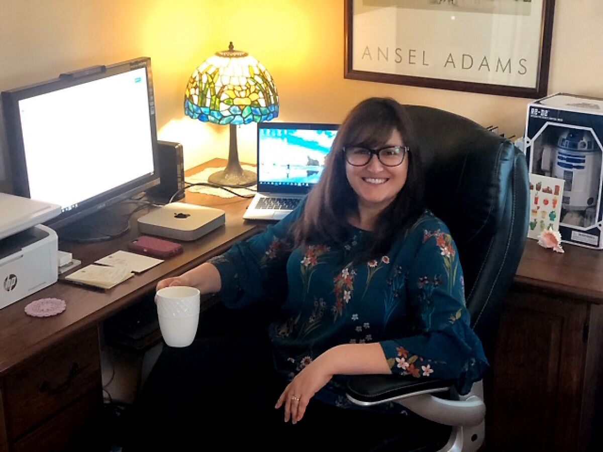 Senior librarian Tina Princenthal, who staffs the Los Angeles Public Library's InfoNow desk, works from home.