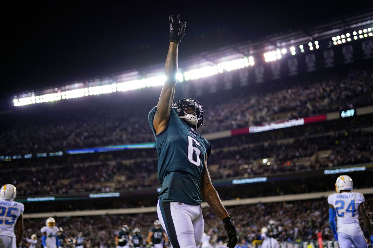 Philadelphia Eagles wide receiver DeVonta Smith (6) celebrates his touchdown during the second half of an NFL football game against the Los Angeles Chargers on Sunday, Nov. 7, 2021, in Philadelphia. (AP Photo/Matt Slocum)
