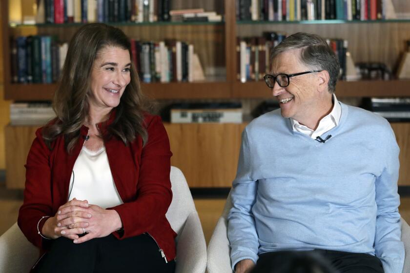 FILE - In this Feb. 1, 2019, file photo, Bill and Melinda Gates smile at each other during an interview in Kirkland, Wash. The couple announced Monday, May 3, 2021, that they are divorcing. The Microsoft co-founder and his wife, with whom he launched the world's largest charitable foundation, said they would continue to work together at The Bill & Melinda Gates Foundation. (AP Photo/Elaine Thompson, File)