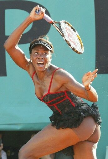 Venus Williams of the US plays a return