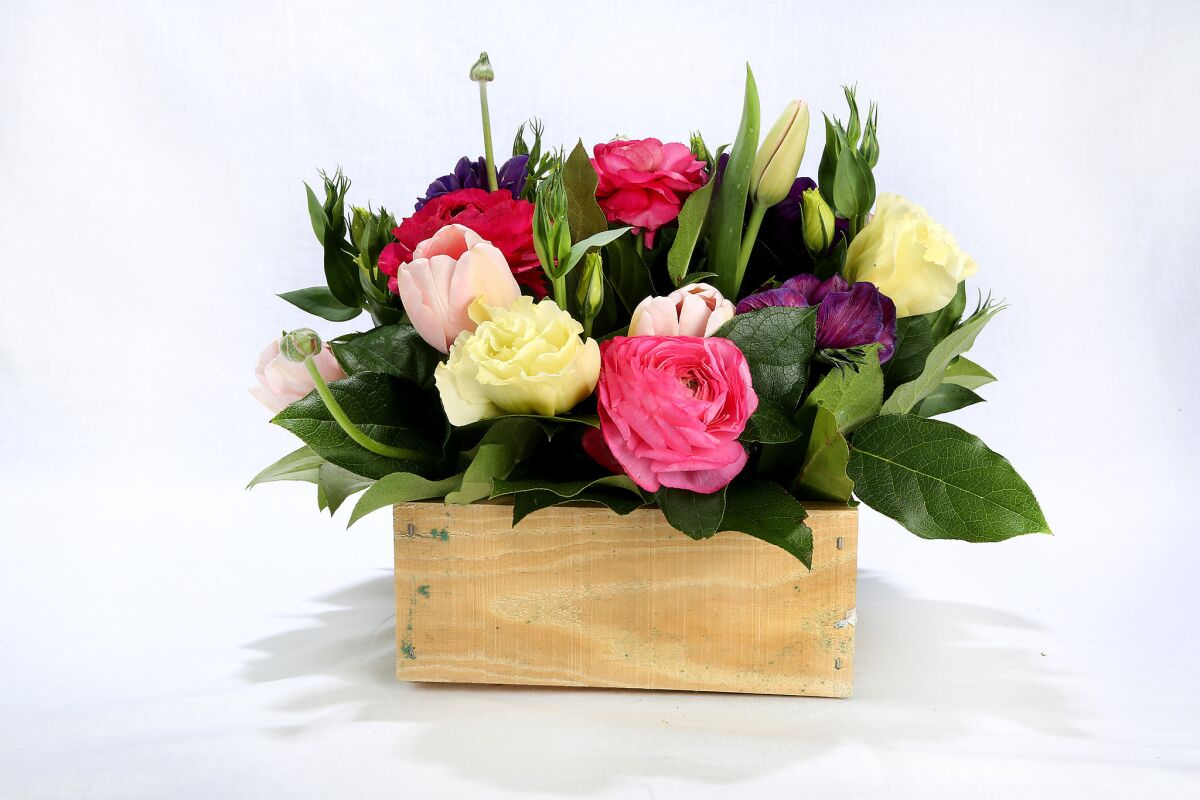 A crate filled with fresh California-grown anemones, tulips, ranunculus, lisianthus and Callistemon citrinus from Spruce LA is $85.