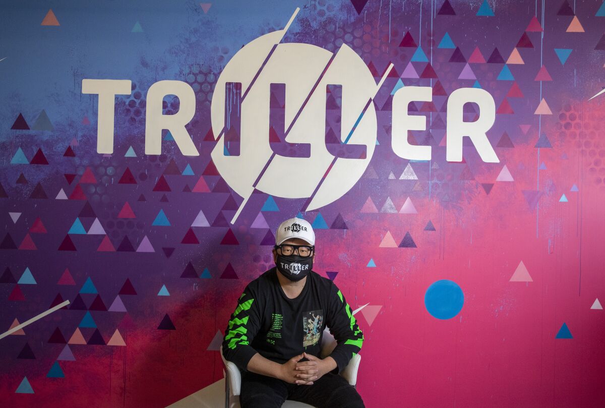 Triller CEO Mike Lu sits for a portrait at Triller's office in Century City.