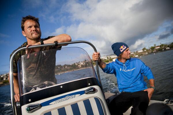 Actor Dylan Bruno pilots his Zodiak toward Catalina Island on a spearfishing trip while Bruno's friend, professional skier Henrik Windstedt of Sweden, enjoys the ride.