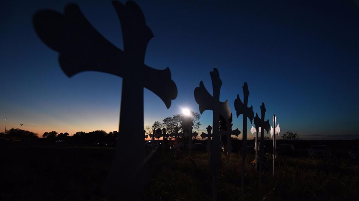A row of crosses for each victim has been placed at a memorial, after a mass shooting that killed 26 people in Sutherland Springs, Texas on Nov. 6.