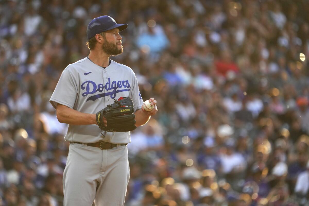 Dodgers pitcher Clayton Kershaw looks on against the Colorado Rockies.