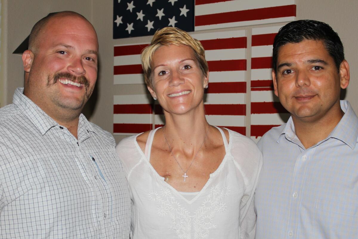 Rep. Raul Ruiz (D-Palm Springs) poses with Jennifer Kepner, middle, and her husband Ben Kepner, 