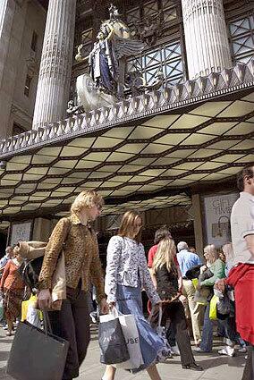 Saturday shoppers outside Selfridges department store on Oxford Street, London.