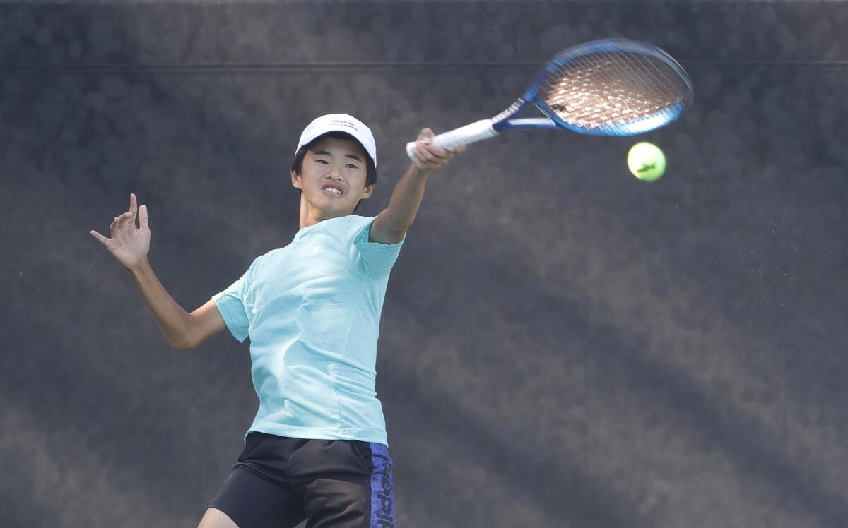 Fountain Valley's David Duon plays in the War by the Shore junior tennis tournament.