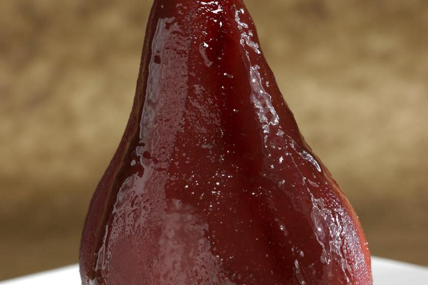 102093.FO.1005.Pears--Studio shot of Poached Pear in a Red Wine Caramel Sauce.