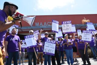 MAAC employees on strike for fair wages outside the company's headquarters in Chula Vista on June 6, 2022.
