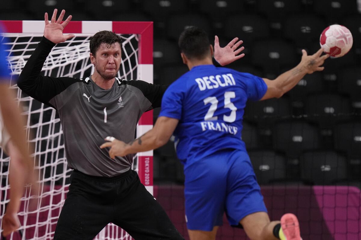 Denmark beat France to historic third handball world title