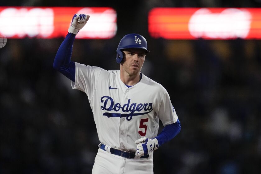 Los Angeles Dodgers' Freddie Freeman (5) celebrates after hitting a home run during the eighth inning of a baseball game against the Washington Nationals in Los Angeles, Tuesday, May 30, 2023. (AP Photo/Ashley Landis)