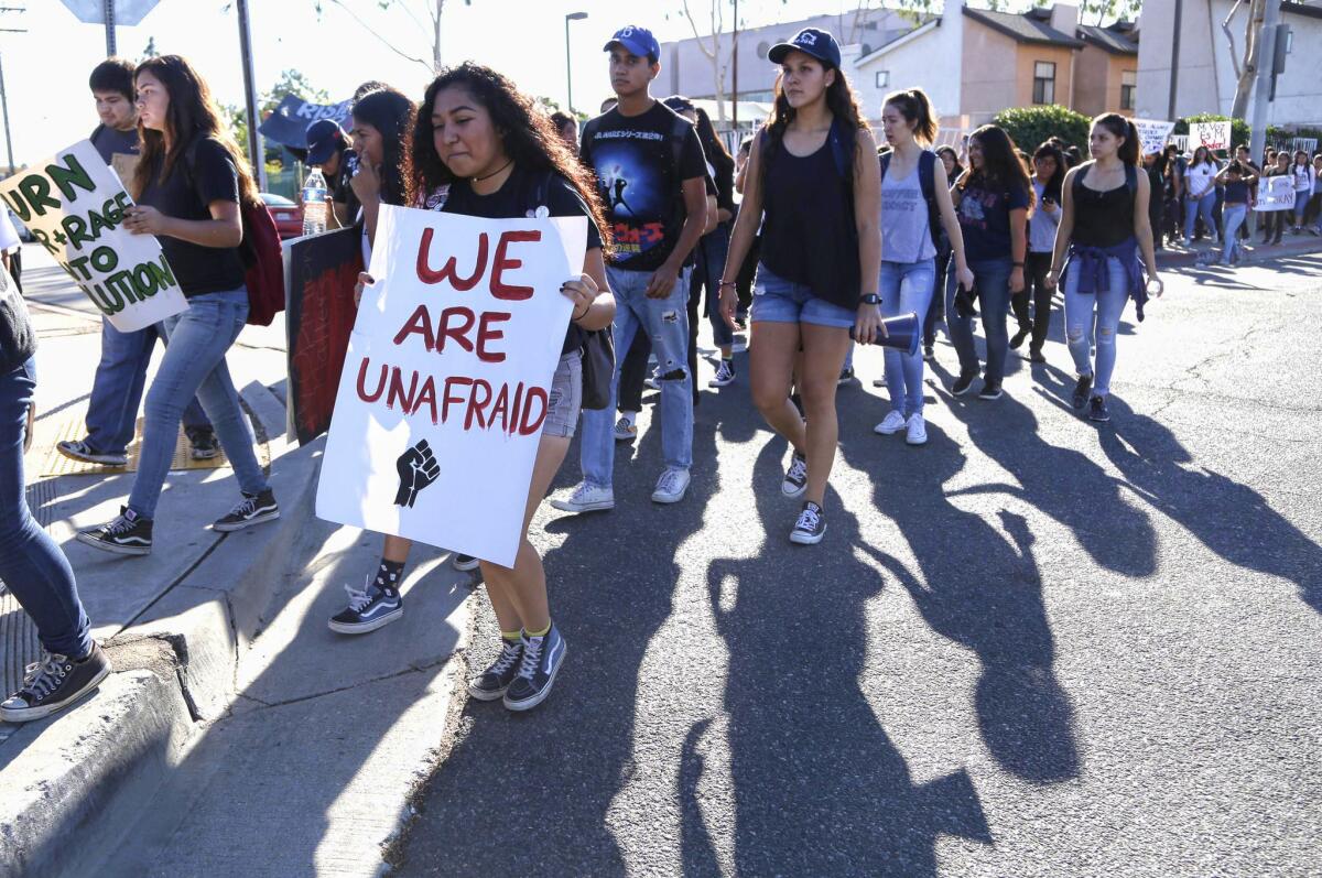 Students holding signs and chanting slogans march to protest the election of Donald Trump as president in Los Angeles on Nov. 14, 2016. Demonstrators have gathered across California and the nation in the six days since Trump was elected.