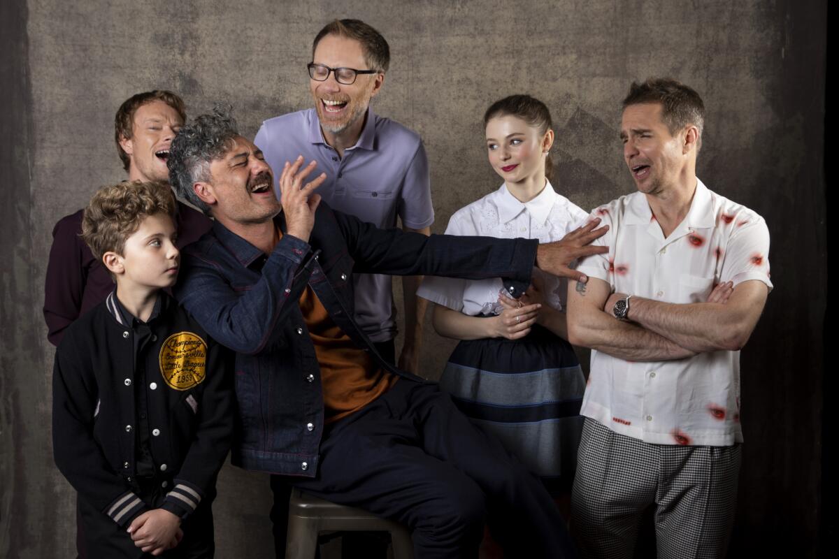 Actors Alfie Allen, Roman Griffin Davis and Stephen Merchant, director-actor Taika Waititi and actors Thomasin McKenzie and Sam Rockwell from "Jojo Rabbit."