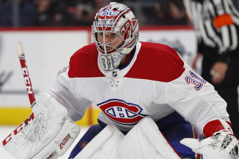 Montreal Canadiens goaltender Carey Price (31) plays against the Detroit Red Wings in the second period of an NHL hockey game, Tuesday, Feb. 26, 2019, in Detroit. (AP Photo/Paul Sancya)
