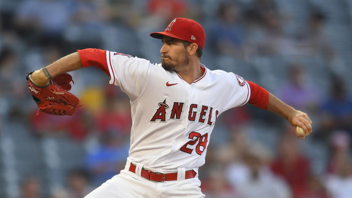 Angels pitcher Andrew Heaney throws during the first inning against the Colorado Rockies.