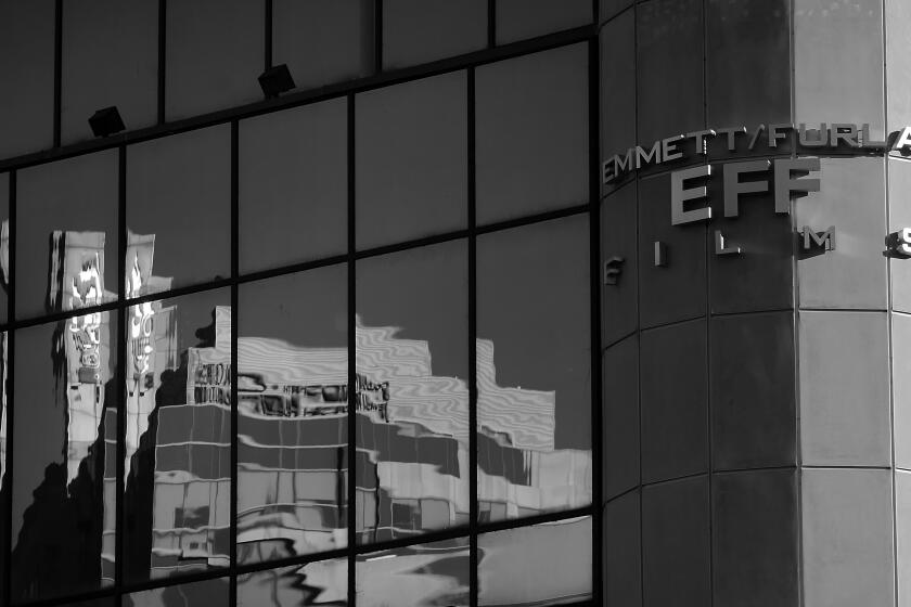 LOS ANGELES, CALIF. - JUNE 21, 2022. Exterior of the Emmett / Furla Films building at the intersection of Wilshire and San Vicente boulevards in Los Angeles. (Luis Sinco / Los Angeles Times)