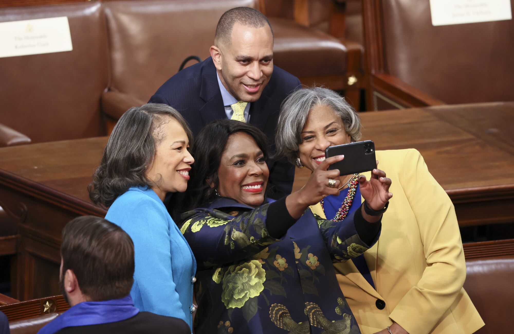 Four lawmakers take a picture.