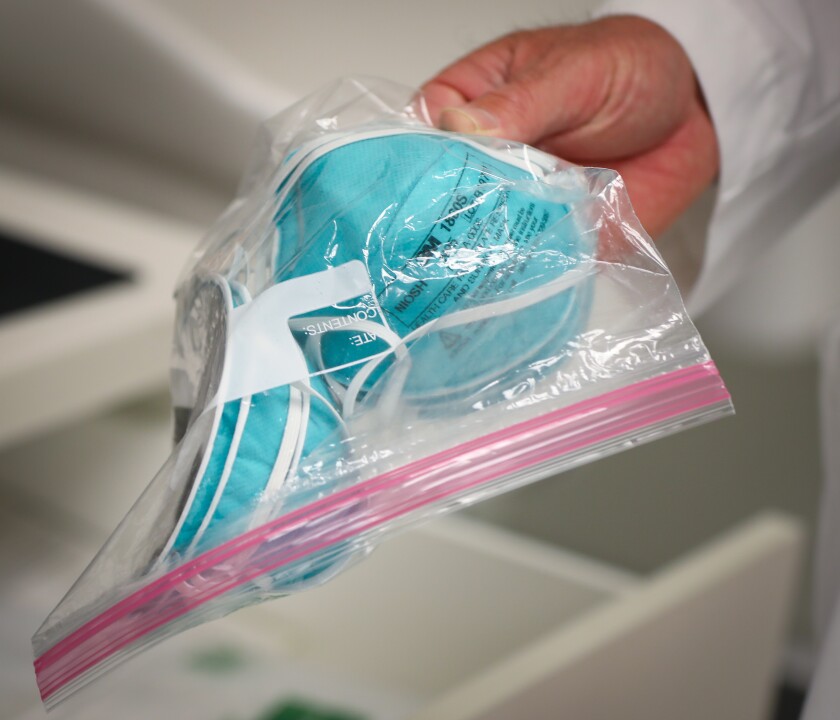 Download Free L A County Healthcare Workers Told To Reuse Masks Amid Shortage Los Angeles Times Best Free SVG Cut Files