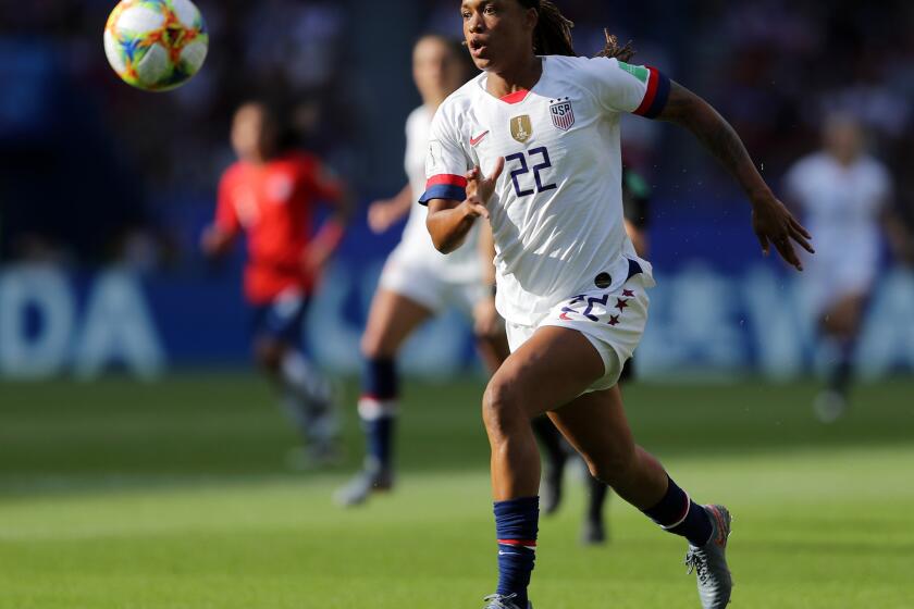 U.S. forward Jessica McDonald runs with the ball during the team's 3-0 victory over Chile in group play at the World Cup on June 16.