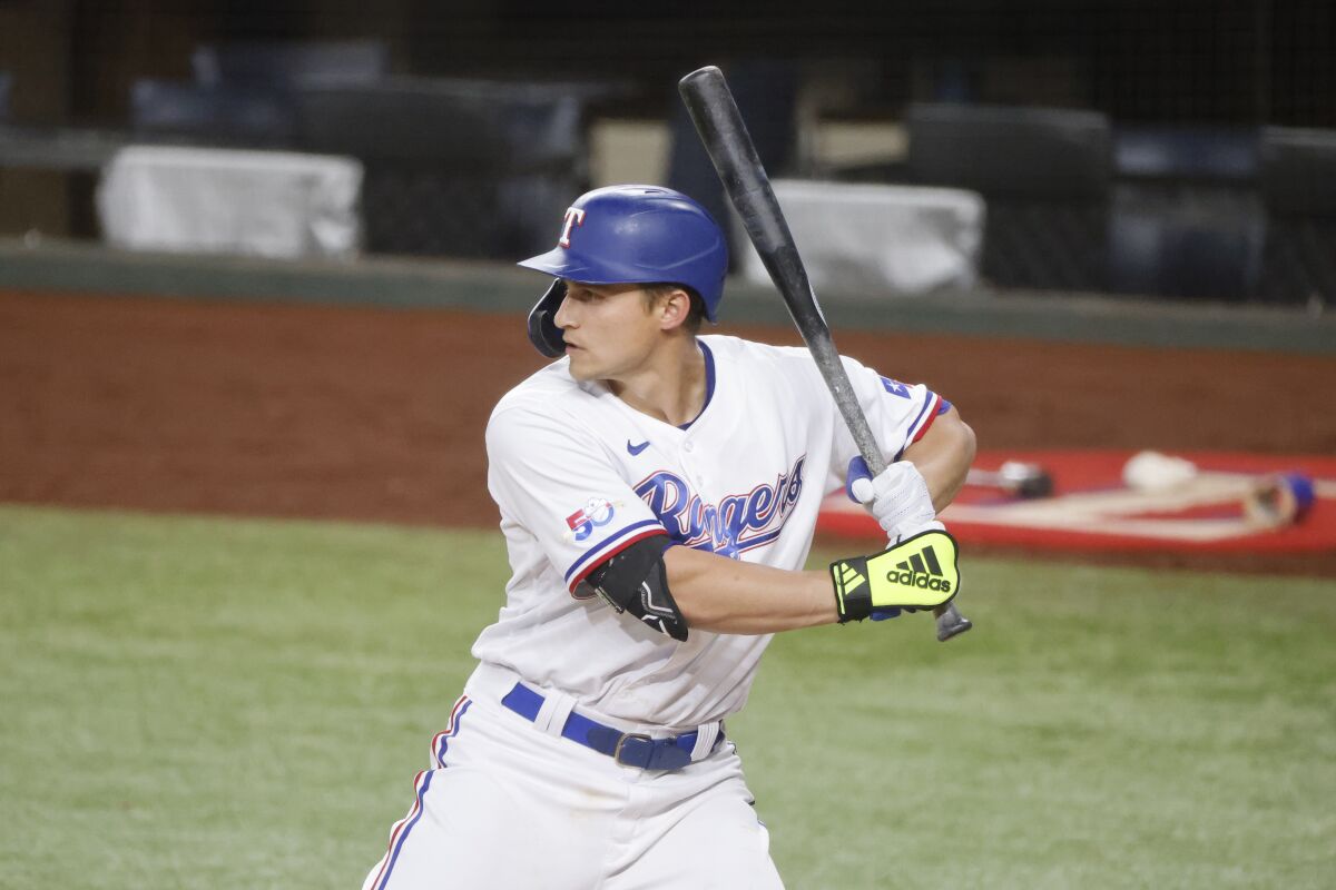 The Texas Rangers' Corey Seager bats during the third inning April 14, 2022, in Arlington, Texas.