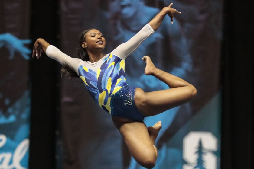 ANAHEIM, CA, SATURDAY, JANUARY 4, 2020 The 2020 UCLA gymnast Nia Dennis competes on the floor competition at the Collegiate Challenge gymnastics meet at the Anaheim Convention Center. (Robert Gauthier/Los Angeles Times)
