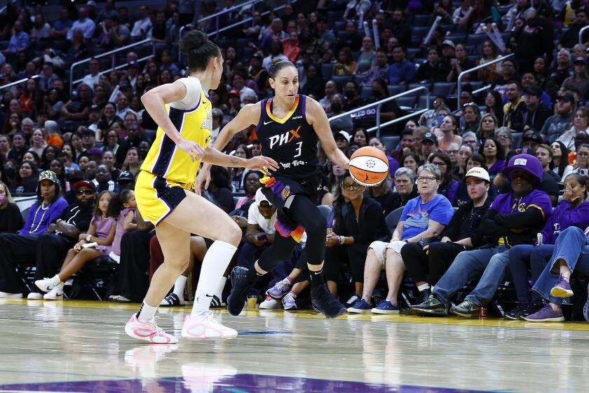 LOS ANGELES, CALIFORNIA - SEPTEMBER 17: Diana Taurasi #3 of the Phoenix Mercury controls the ball against Kia Nurse #10 of the Los Angeles Sparks in the second half at Crypto.com Arena on September 17, 2024 in Los Angeles, California. NOTE TO USER: User expressly acknowledges and agrees that, by downloading and or using this Photograph, user is consenting to the terms and conditions of the Getty Images License Agreement. (Photo by Ronald Martinez/Getty Images)