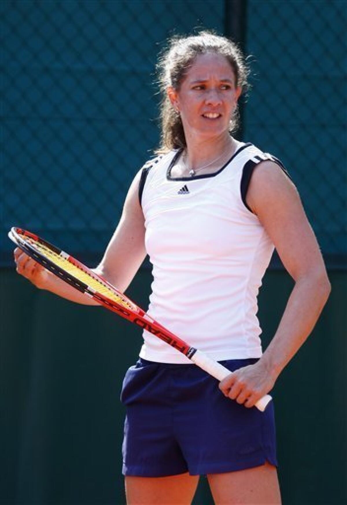 Switzerland's Patty Schnyder reacts during a training session, at Roland Garros stadium in Paris, Saturday, May, 21, 2011. The French Open tennis tournament starts Sunday.(AP Photo/Bertrand Combaldieu)