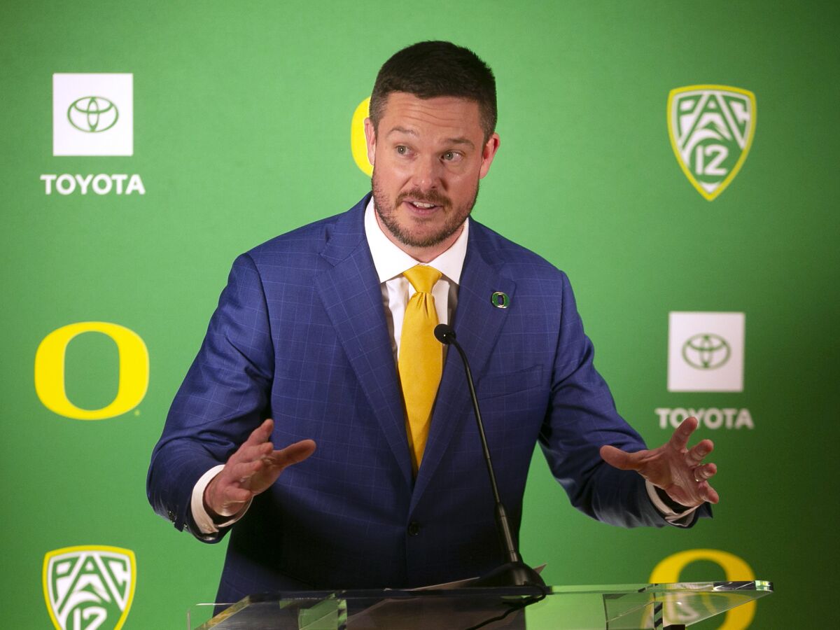 New Oregon football head coach Dan Lanning takes questions from media after being formally introduced by the Ducks, Monday Dec. 13, 2021, in Eugene, Ore. Oregon hired Georgia defensive coordinator Lanning as head coach Saturday, completing a search for Mario Cristobal's replacement that took less than a week. (Chris Pietsch/The Register-Guard via AP)