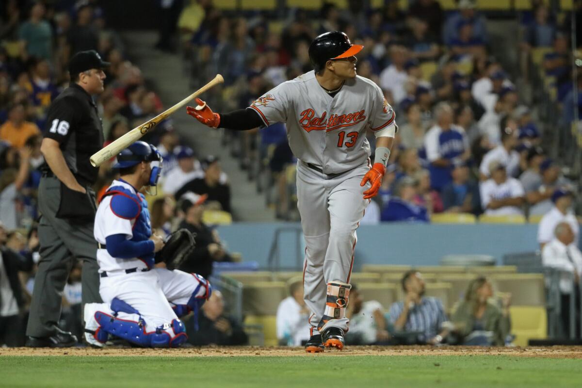 Orioles third baseman Manny Machado (13) watches his three-run home run exit during the fifth inning.