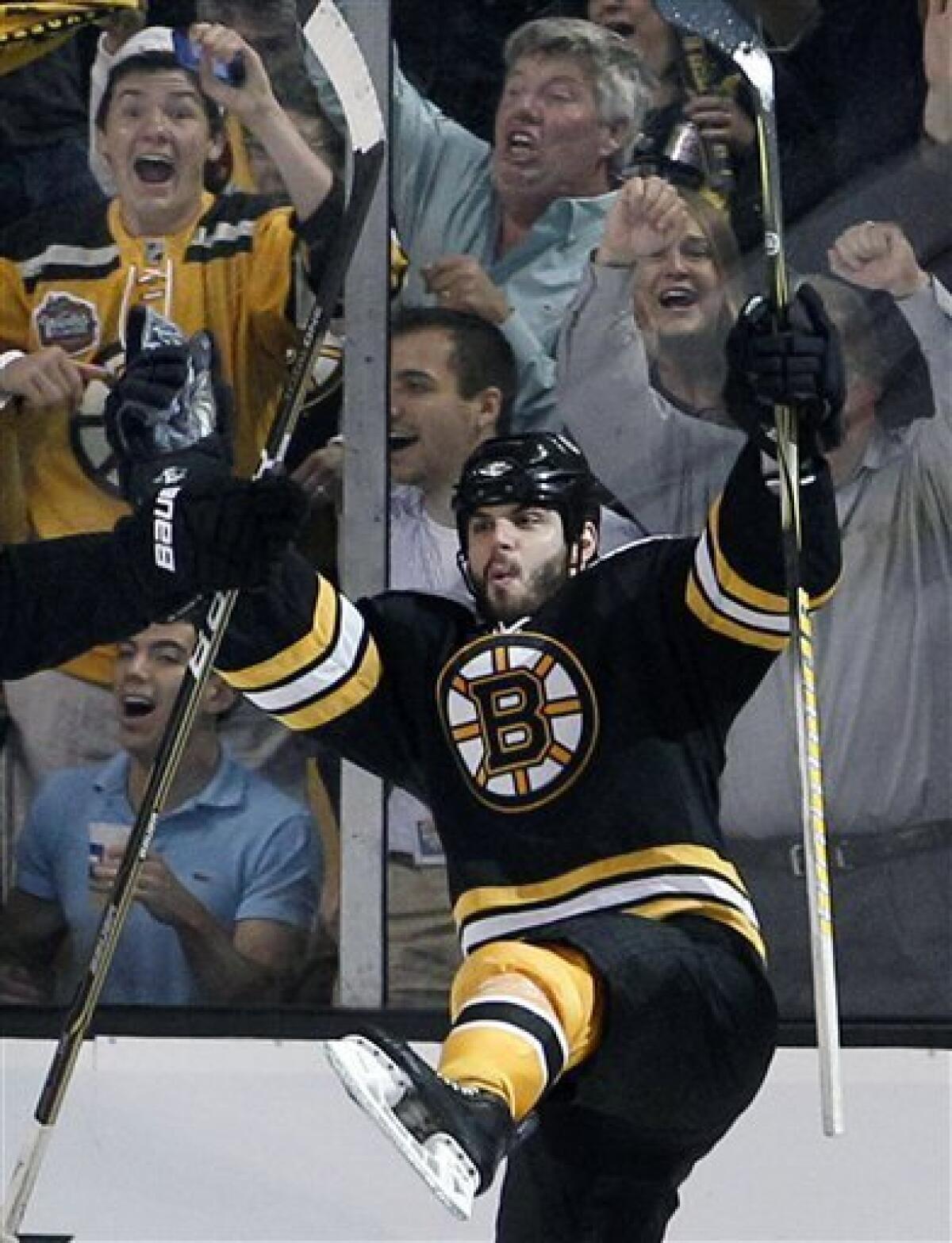 Pittsburgh Penguins' Andrew Ference (7) celebrates his game