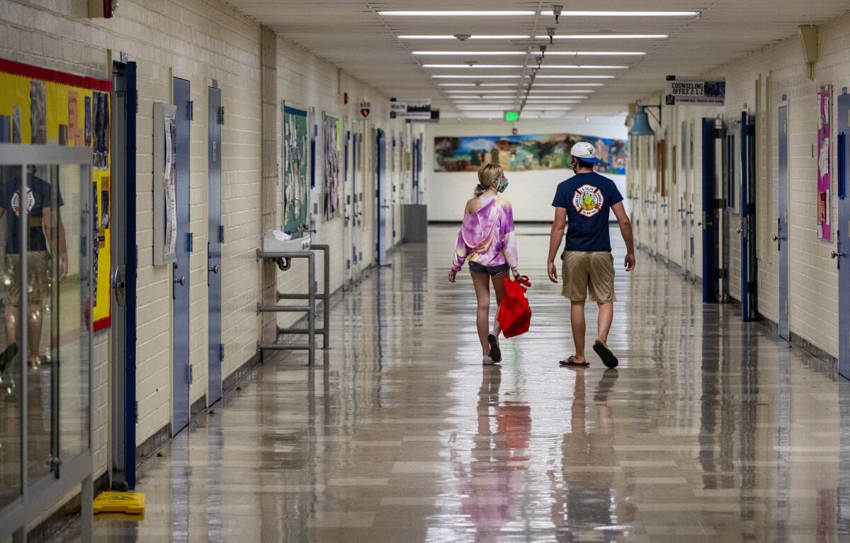 Students gather books and belongings at El Camino Real Charter High School