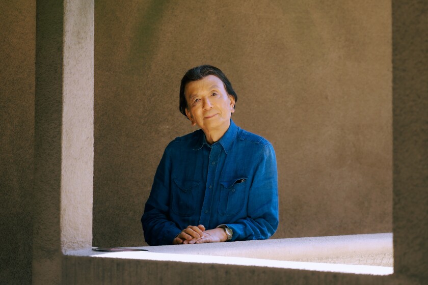 James Hong poses for a portrait at home 