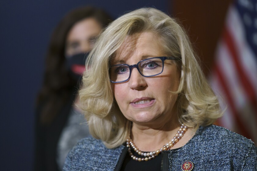 Liz Cheney speaks with reporters on Capitol Hill. 