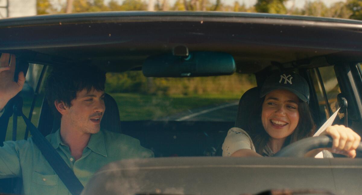 A couple drives to a getaway.