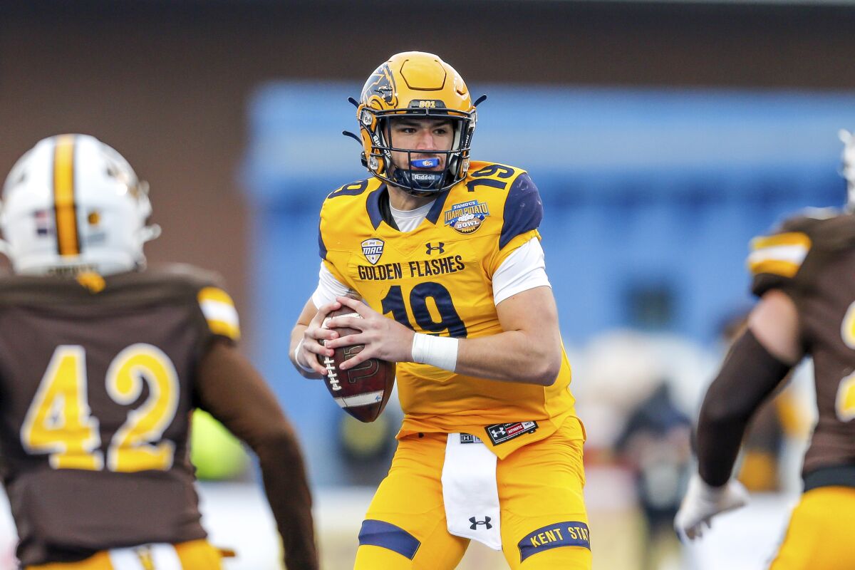 Kent State quarterback Collin Schlee looks to pass against Wyoming during the 2021 Idaho Potato Bowl.