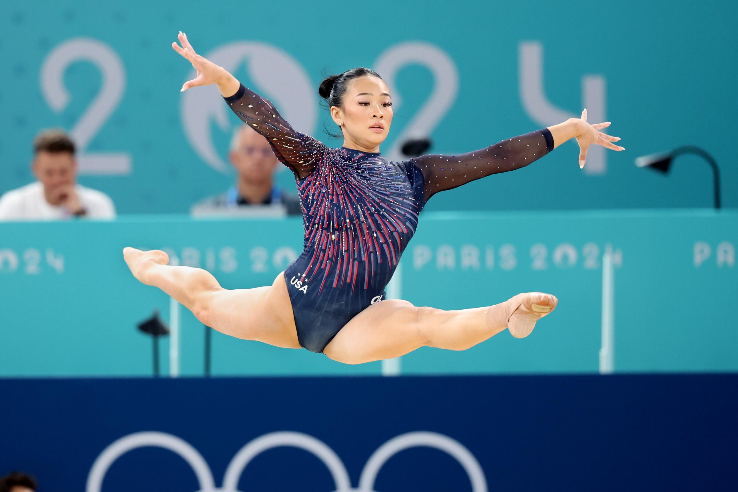 U.S. gymnast Suni Lee performs on the floor during podium training Thursday.