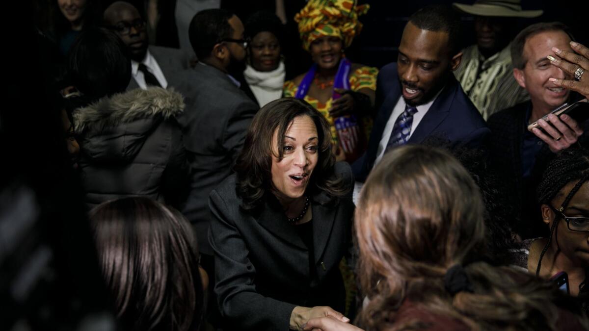 Sen. Kamala Harris of California campaigns at an Iowa Democratic Party Black Caucus dinner in Des Moines.