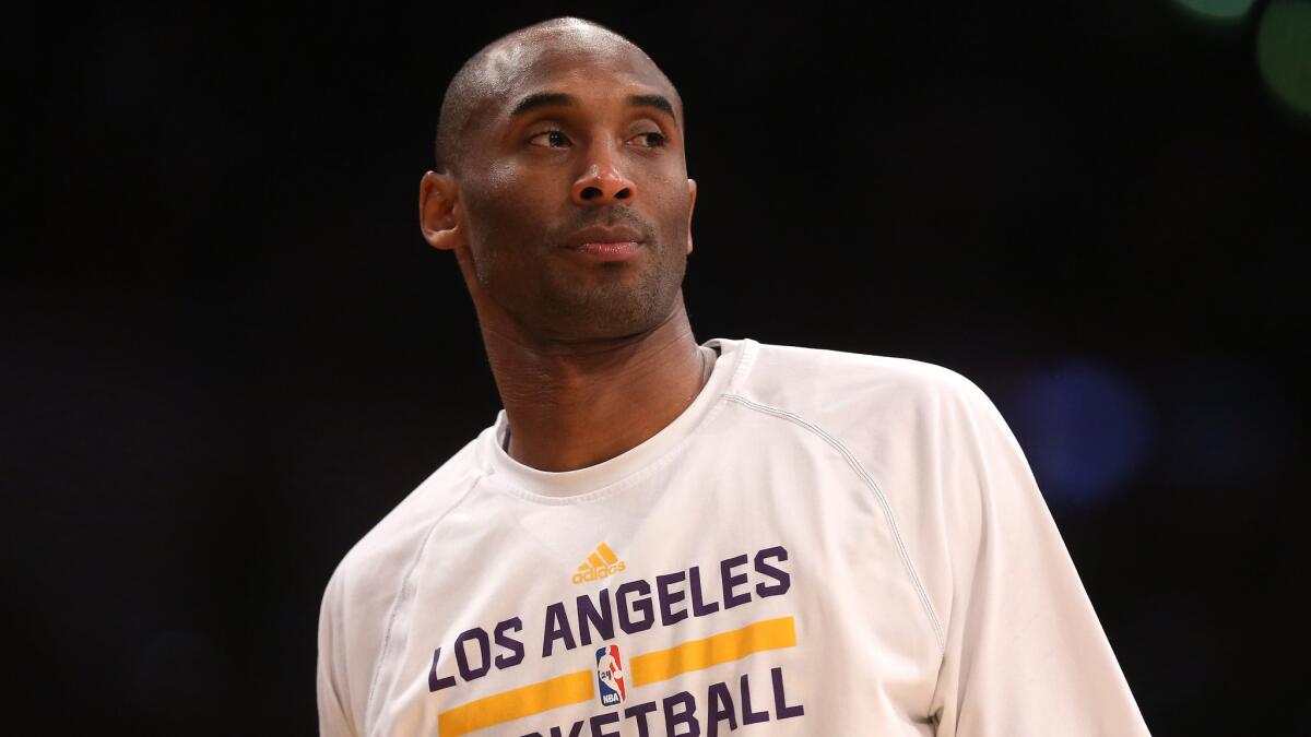 Lakers guard Kobe Bryant watches from the sideline during a game earlier this year.
