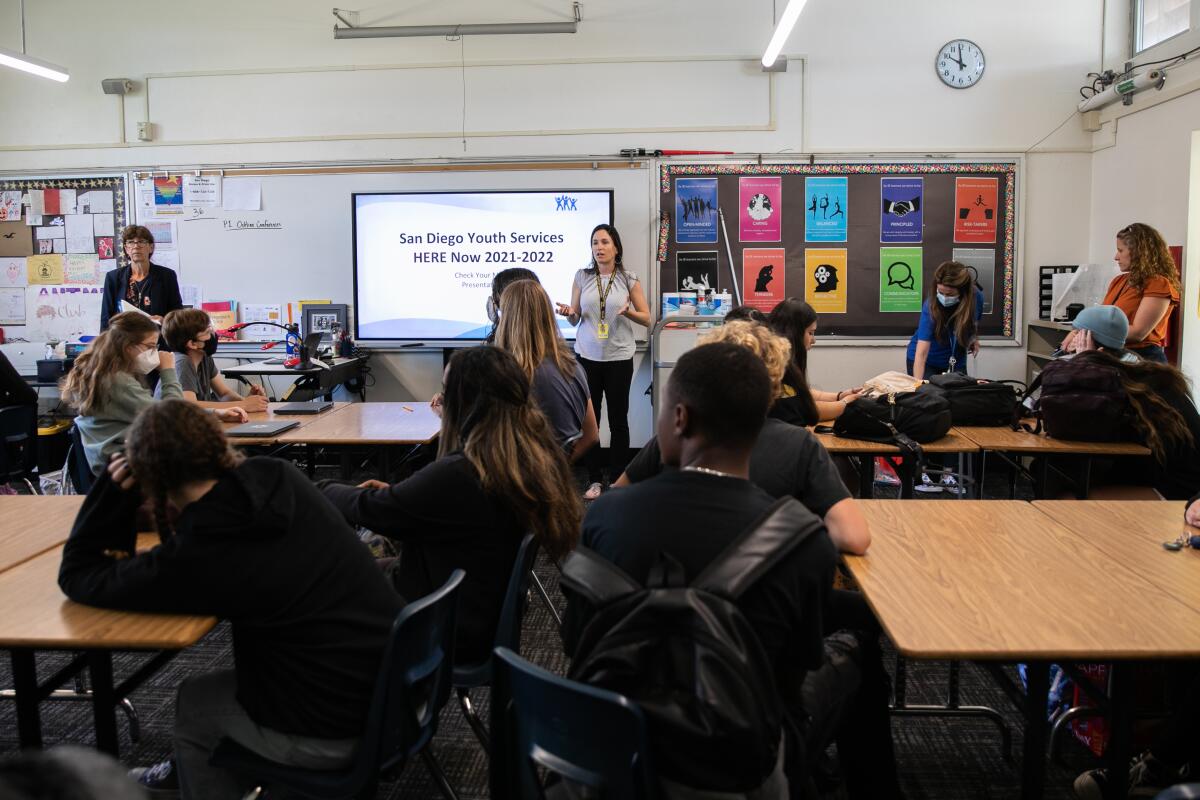 Caroline Karozckai welcomes 10th grade students to a suicide prevention presentation by San Diego Youth Services.