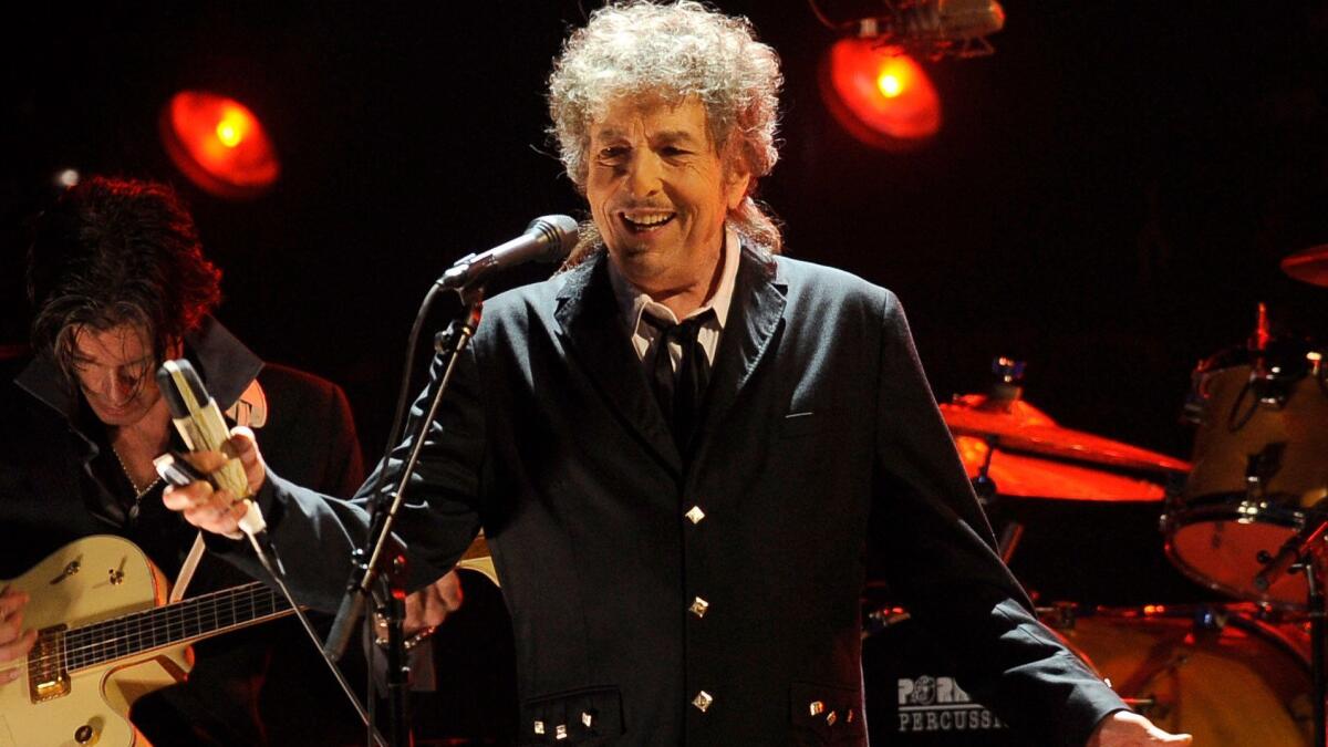 Bob Dylan, shown in L.A. in 2012, is releasing "Triplicate," a triple album with 30 more songs from the Great American Songbook of pop standards, on March 31.