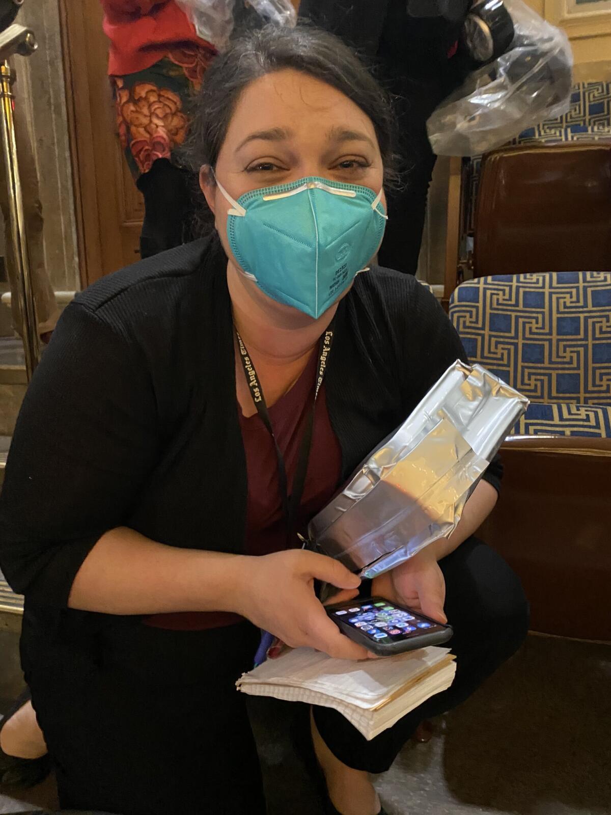 Times staff writer Sarah Wire in the House gallery during Wednesday's riots at the Capitol