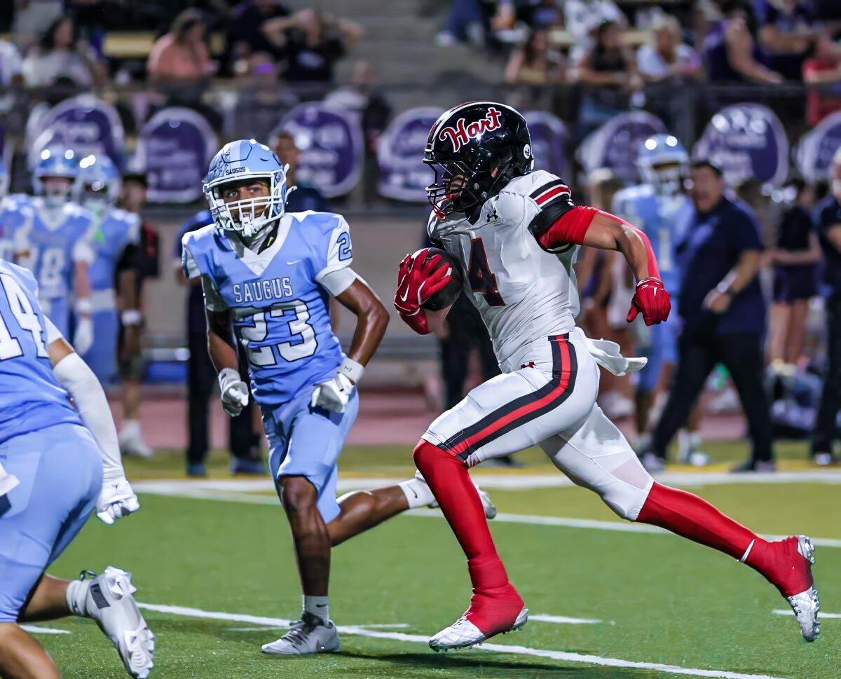 Matix Frithsmith takes off on a run for Hart against Saugus.