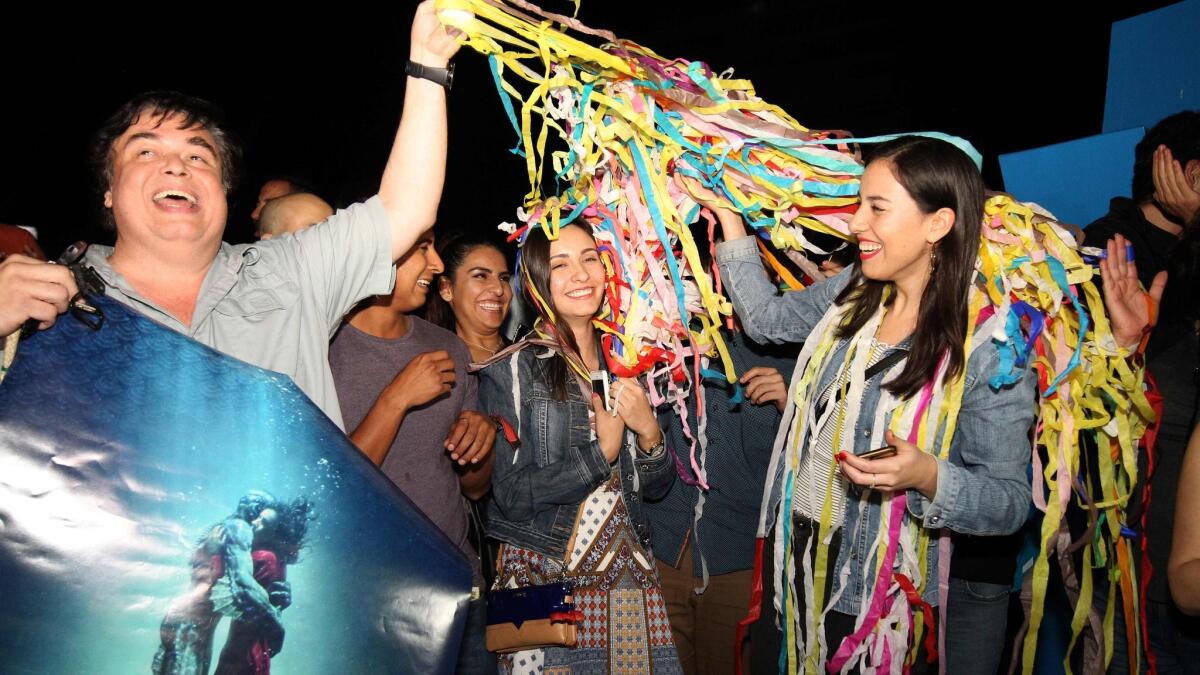 Fans of Mexican director Guillermo del Toro celebrate at La Minerva square in Guadalajara, Mexico, on March 4, 2018.